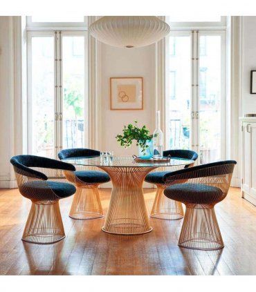 Ambiente comedor con silla Platner