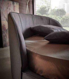 Cama redonda tapizada Kamila, detalle