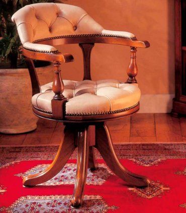 Sillón de piel giratorio Delyan