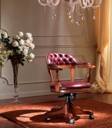 Sillón giratorio de piel Nerada