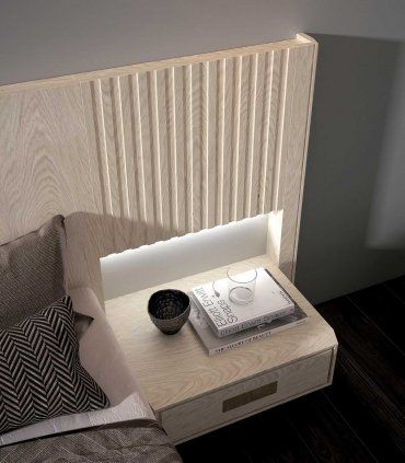 Cama con mesitas integradas Antara, detalle