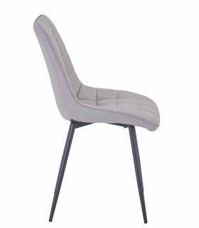 Silla de polipiel con patas de acero.