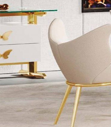 Sillón tapizado de acero Butter de Ámbar Muebles